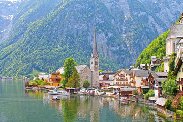 Fototapeta na wymiar View of Hallstatt village from lake Hallstater See in Alps. Austria. Popular tourist destination.