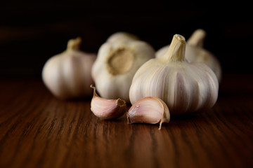 Garlic bulb on the wooden vintage background
