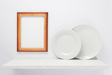plate at wooden shelf