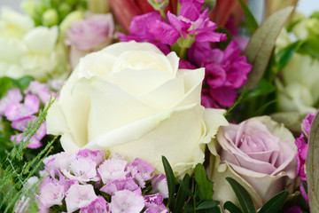 bouquet with roses and many colorful flowers