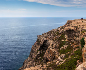 Fototapeta na wymiar View of the scenic cliff coast of Lampedusa