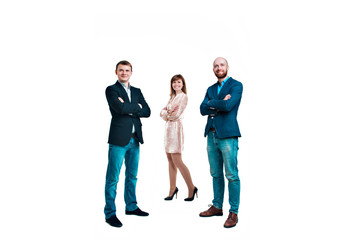 Fototapeta premium Business development concept: three people looking forward on a white background. Three attractive business people in suits stand next to each other all facing forward