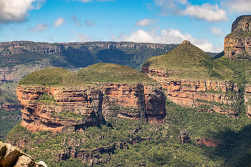 Blyde River Canyon and The Three Rondavels (Three Sisters) in Mpumalanga, South Africa. The Blyde River Canyon is the third largest canyon worldwide