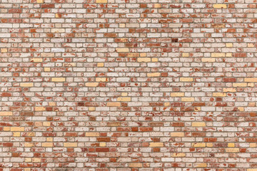 Texture of different colors brick wall as a background or wallpaper