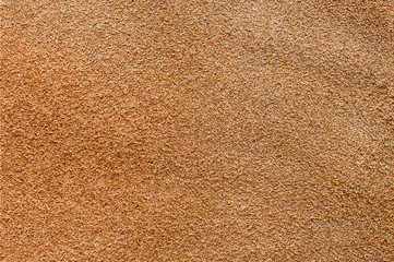 Texture of suede as background. Beige color