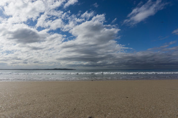 waves in the ocean and blue sky