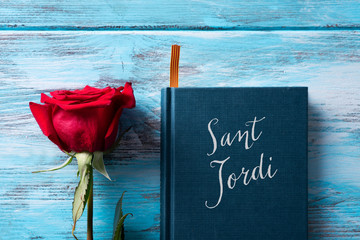 rose, catalan flag, book and text Sant Jordi.