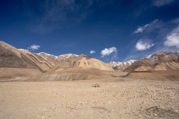 The landscape view of Leh geography. Mountain, Road, Sky and Snow. Leh, Ladakh, India.