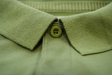 Close up of male polo shirt with buttoned collar neck