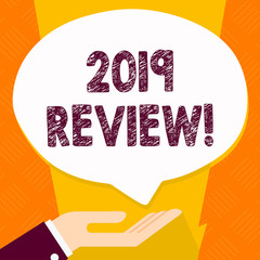 Text sign showing 2019 Review. Business photo text remembering past year events main actions or good shows Palm Up in Supine Position for Donation Hand Sign Icon and Speech Bubble
