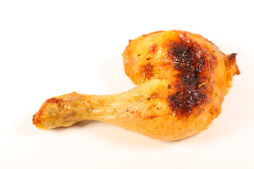 grilled chicken leg isolated on white background