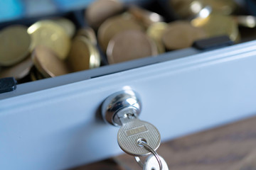 Cashbox lock with keys and full of Coins