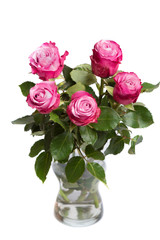 bunch of pink flowers in glass vase isolated on white