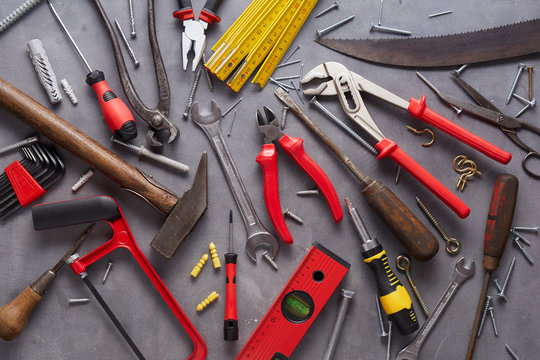 Variety of old and modern household hand tools