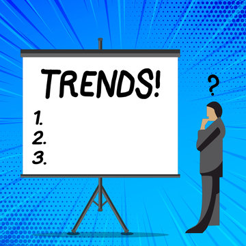 Word writing text Trends. Business photo showcasing General projected directions of something according to time Businessman with Question Mark Above his Head Standing Beside Blank Screen