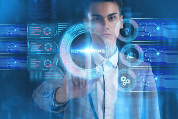 The concept of business, technology, the Internet and the network. A young entrepreneur working on...