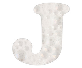 Letter J, soap foam background. Top view