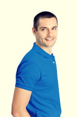 Fototapeta premium Portrait of happy smiling young man, isolated on white background