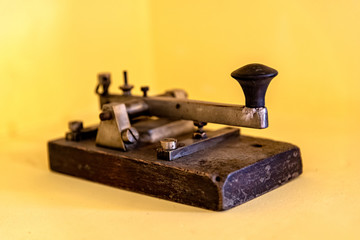 Terminal to make morse code and communicate in that way, on a yellow background