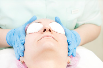 Process cosmetic mask of massage and facials in beauty salon 