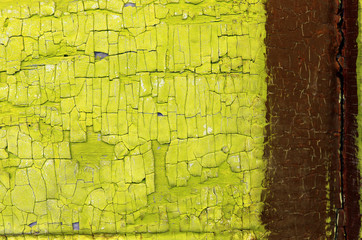 Old wooden background with remains of pieces of scraps of old paint on wood. Texture of an old tree, vintage wood background peeling paint. old blue board with cracked paint