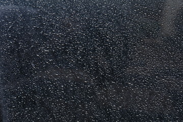 dirty black car with water stained dry