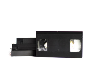 Obraz premium Four video tapes on a white background