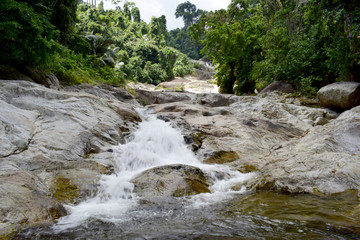 Fototapeta premium Ai Kiew Waterfall Landscape in the Dry Season, Nakhon Si Thammarat Province, Thailand, 30 March 2019