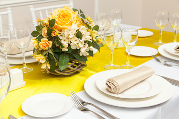 The served table with beautiful setting in restaurant