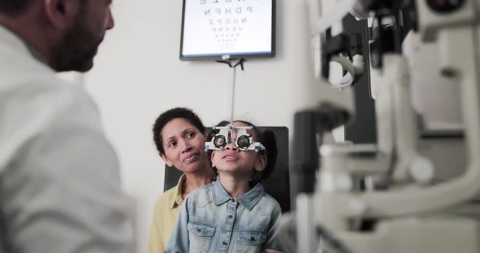 Young girl having an eye test