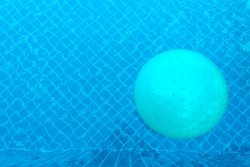 Ball floating on the pool
