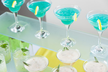 Set of cocktails at the bar, bright colored.