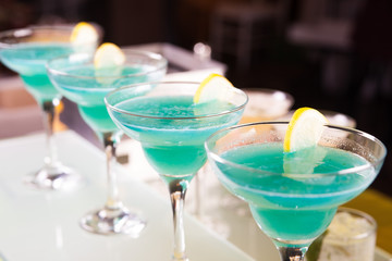 Set of cocktails at the bar, bright colored.