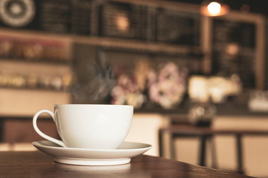 A cup of coffee time in cafe blurred background.
