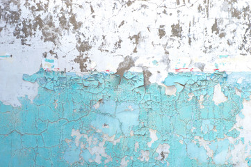 Fototapeta na wymiar Peeling paint on wall blue grunge material texture