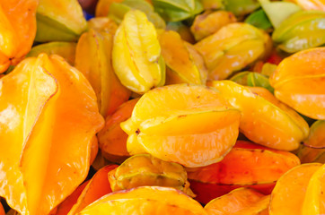 carambola fruit or fruit star for sale in market stacked