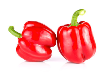 Pair of red bellpepper isolated on white background