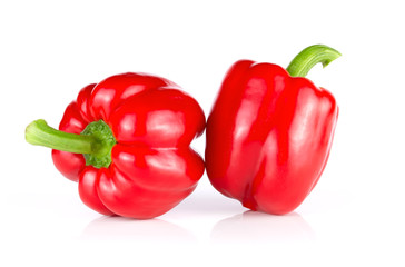 Pair of red bellpepper isolated on white background