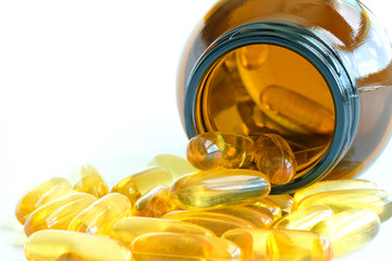 Good fatty fish oil and vitamin E supplements, health and body.