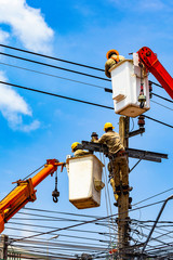 The electrical worker  are repairing the electrical system