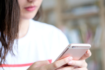 A pretty face girl, she is using smartphone and an internet network buy shopping online .Technology and Business concept