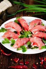 Fresh caraway beef in a white dish
