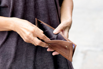 hand of senior open pocket, no money in the business wallet, Financial concepts and expenditures,