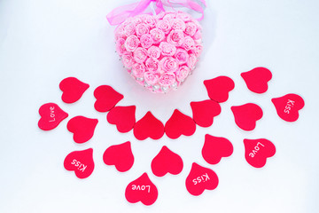 Symbol of love red paper hearts with labels and pink handmade decoration for wedding celebration for valentine day