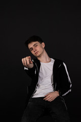 Fototapeta premium handsome young man posing on black background