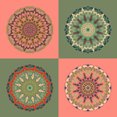 Set - four mandalas, pink-green background, symmetrical round patterns in warm shades: beige, brown, green. Room design, fashionable fabric, a symbol of harmony, national motives.