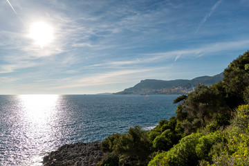 Sunlight reflected on the sea of Cap Martin in a sunny winter day