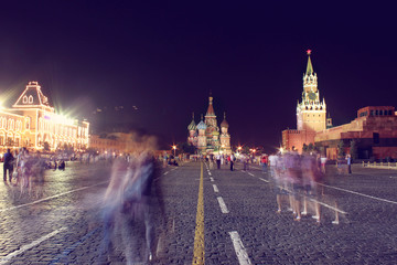 Moscow, tourists walk on Red Square on a warm summer night