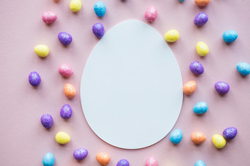 Easter egg lay flat background. Blank white egg ready for text