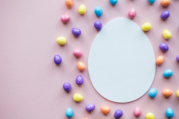 Easter egg lay flat background. Blank white egg ready for text
